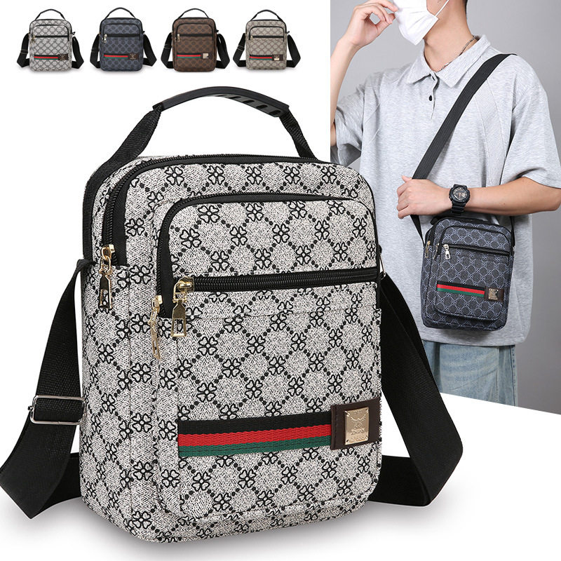 2026新款PU质感单肩包男多层通勤百搭手提包民族风钱币印花斜挎包