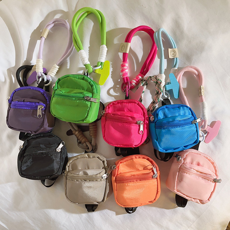 潮流个性彩色收纳零钱袋小书包编织尼龙手绳适用通用手机壳创意网红ins男女款钥匙扣耳机套便携腕带手环挂绳