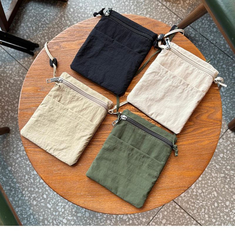 包轻量化超薄帆布小包包极简风斜挎零钱包男女同款袋