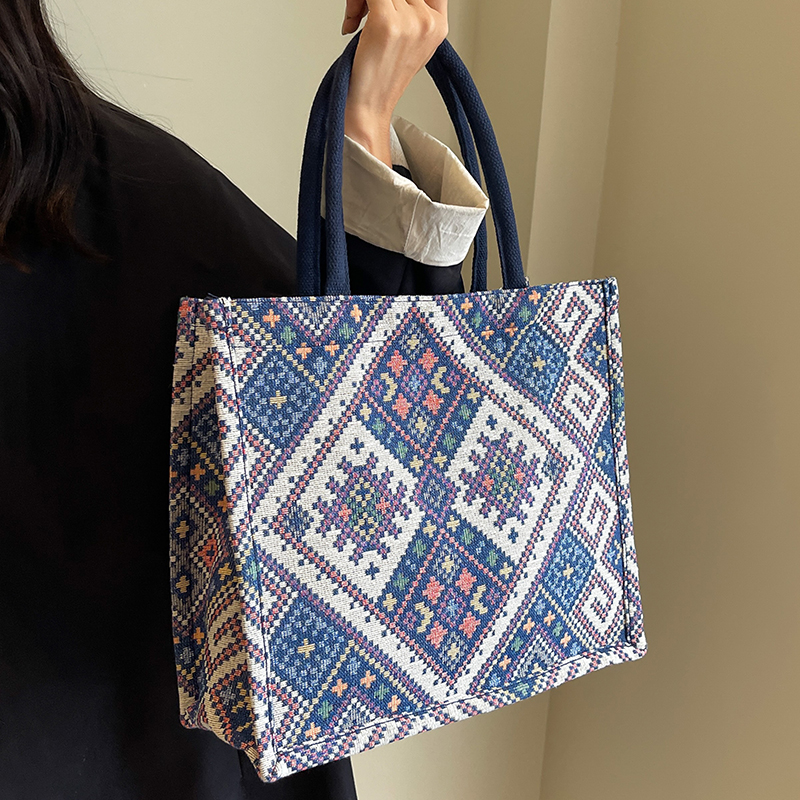 2023早秋新款通勤妈咪包