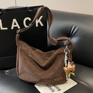 大容量饺子包包女2026新款韩版时尚通勤斜挎包女大学生上课单肩包