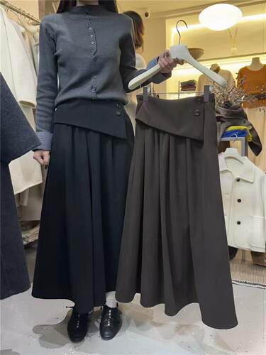 极简风设计感高腰A字半身裙女2026秋季新款褶皱纽扣休闲时尚长裙