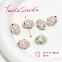 Светло -розовая розовая и зеленая рыба