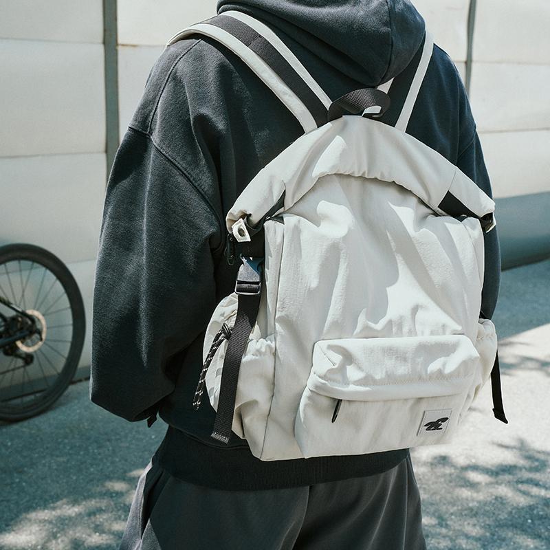 喂牌新款卷盖大容量双肩包