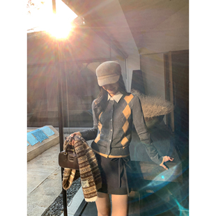 pusumede 伦敦随想 黑色a字半身裙女系带蝴蝶结防走光显瘦短裙