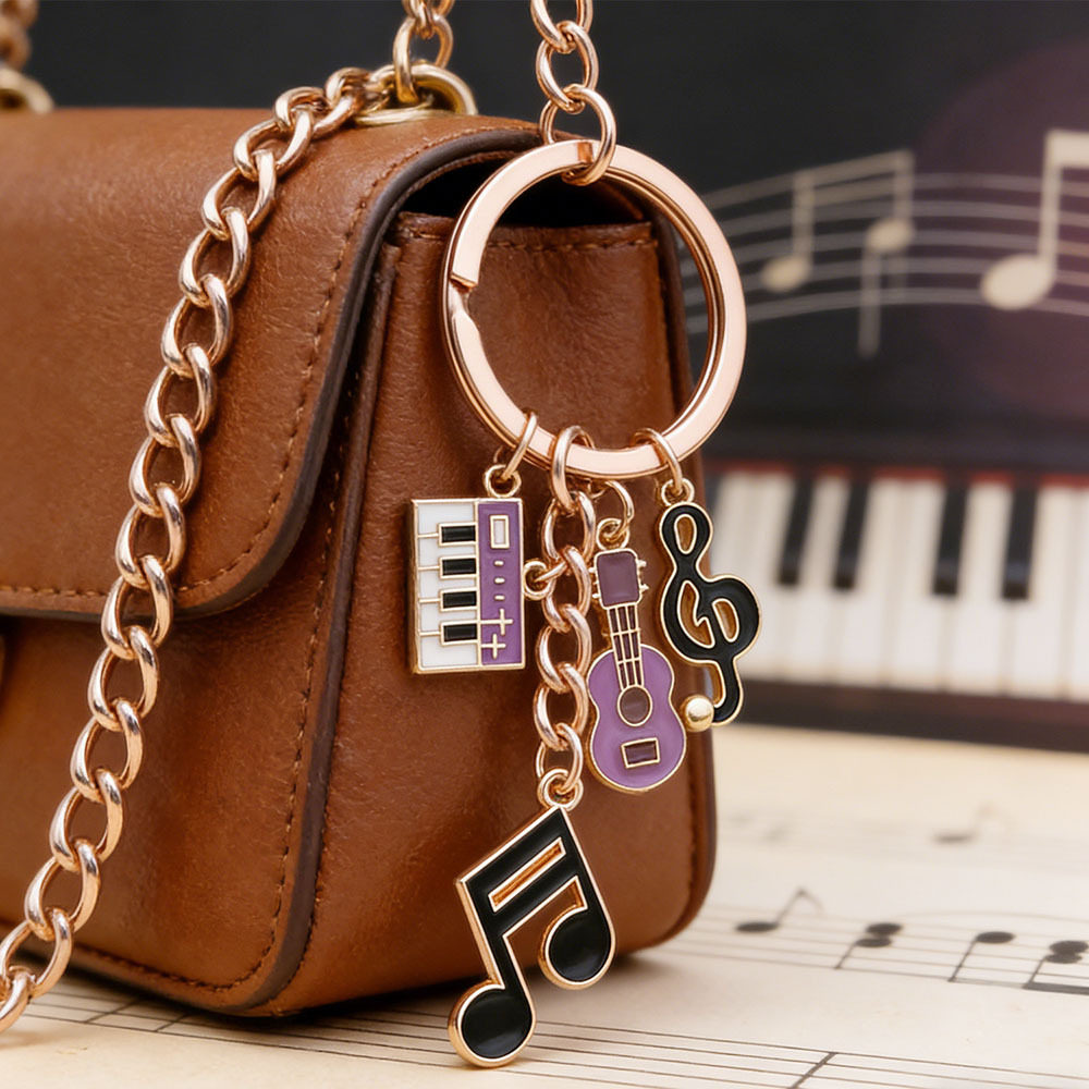 紫色滴油音乐吉他电子琴乐符合金钥匙扣创意潮流男女背包饰品挂件