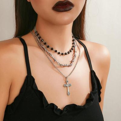 Neck chain cross pendant with dark collarbone chain