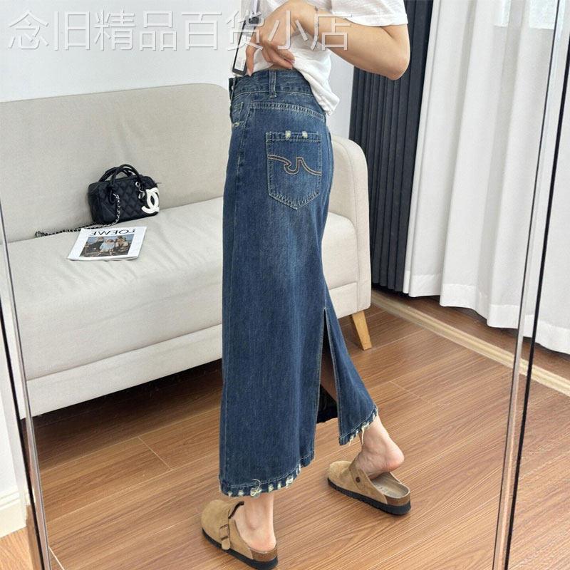 复古蓝色毛边开叉牛仔半身裙女2026夏季新款高腰垂感中长版A字裙