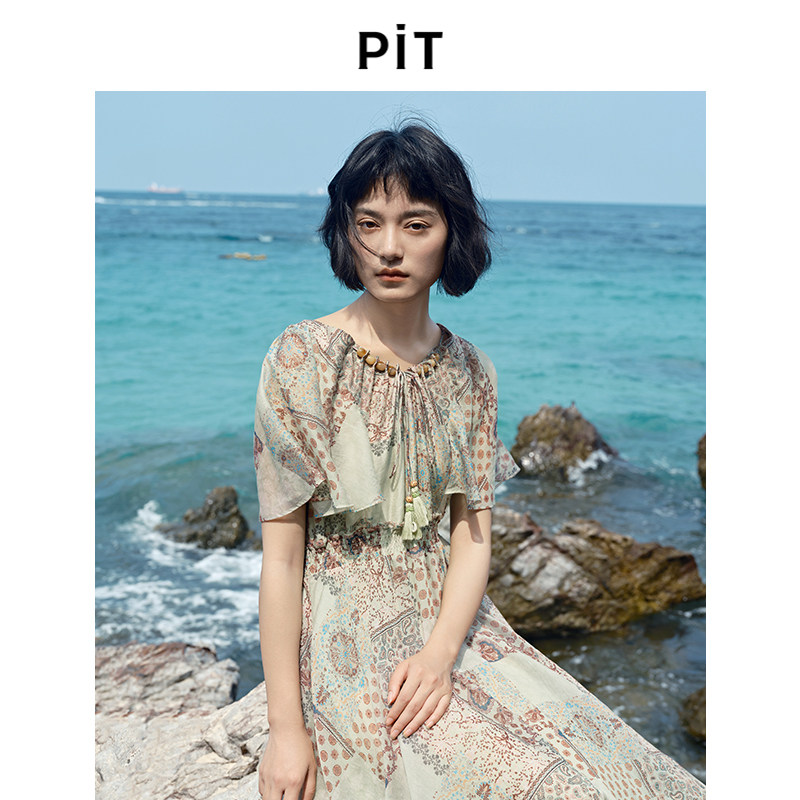 PIT复古碎花收腰不规则A字短袖连衣裙女2025夏波西米亚透气中长裙
