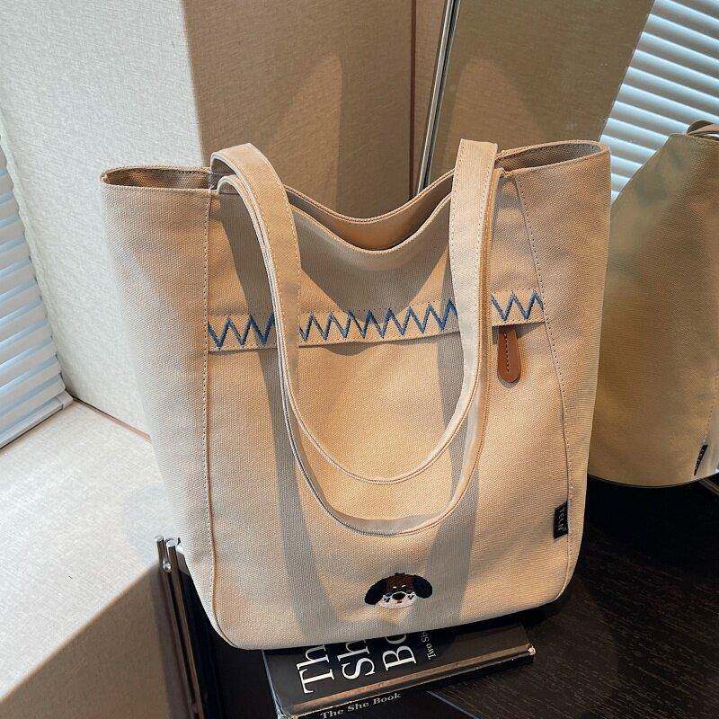 小休闲刺绣帆布包包女大容量学生课手提上MD3238袋百众搭单肩通勤