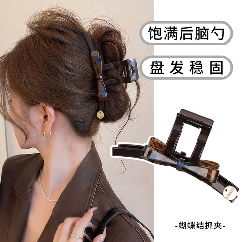 蓝棕蝴蝶结抓夹女鲨鱼夹
