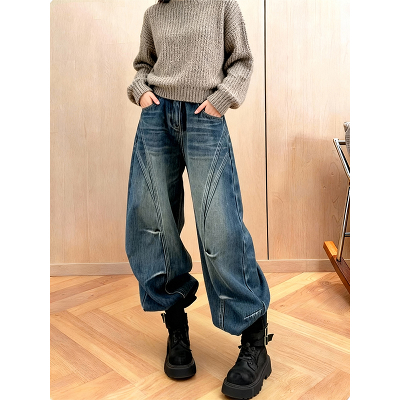 复古高腰水洗做旧加绒弯刀牛仔裤