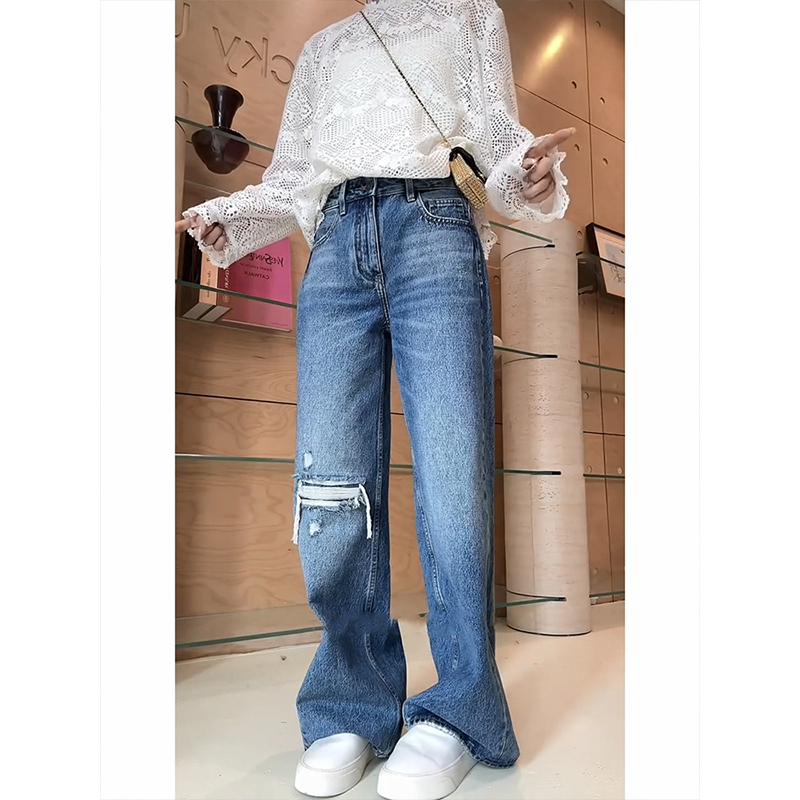 别致流苏假破洞窄版直筒牛仔裤