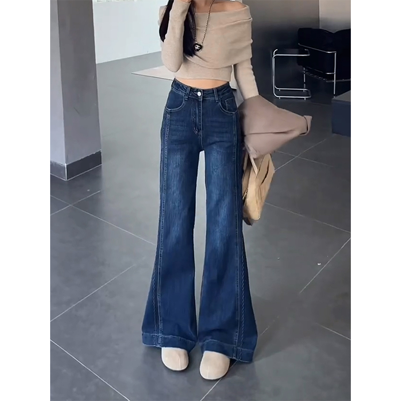 蓝色弹力拼接微喇牛仔裤女2025