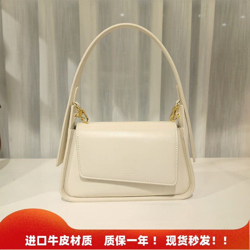 真皮白色包包法棍包高级质感小众女包2026新款夏单肩腋下包斜挎包