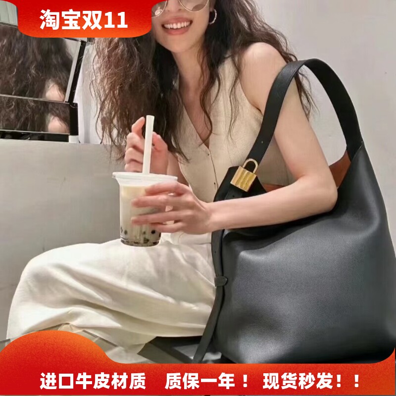 2026秋冬新款真皮托特包大容量锁头水桶包慵懒风单肩斜挎通勤大包