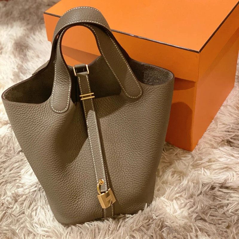 真皮菜篮子女包手提水桶包大容量小众手拎包2025新款包包新娘婚包,箱包皮具/热销女包/男包,水桶包,淘宝优惠券,粉丝福利购,淘宝优惠卷