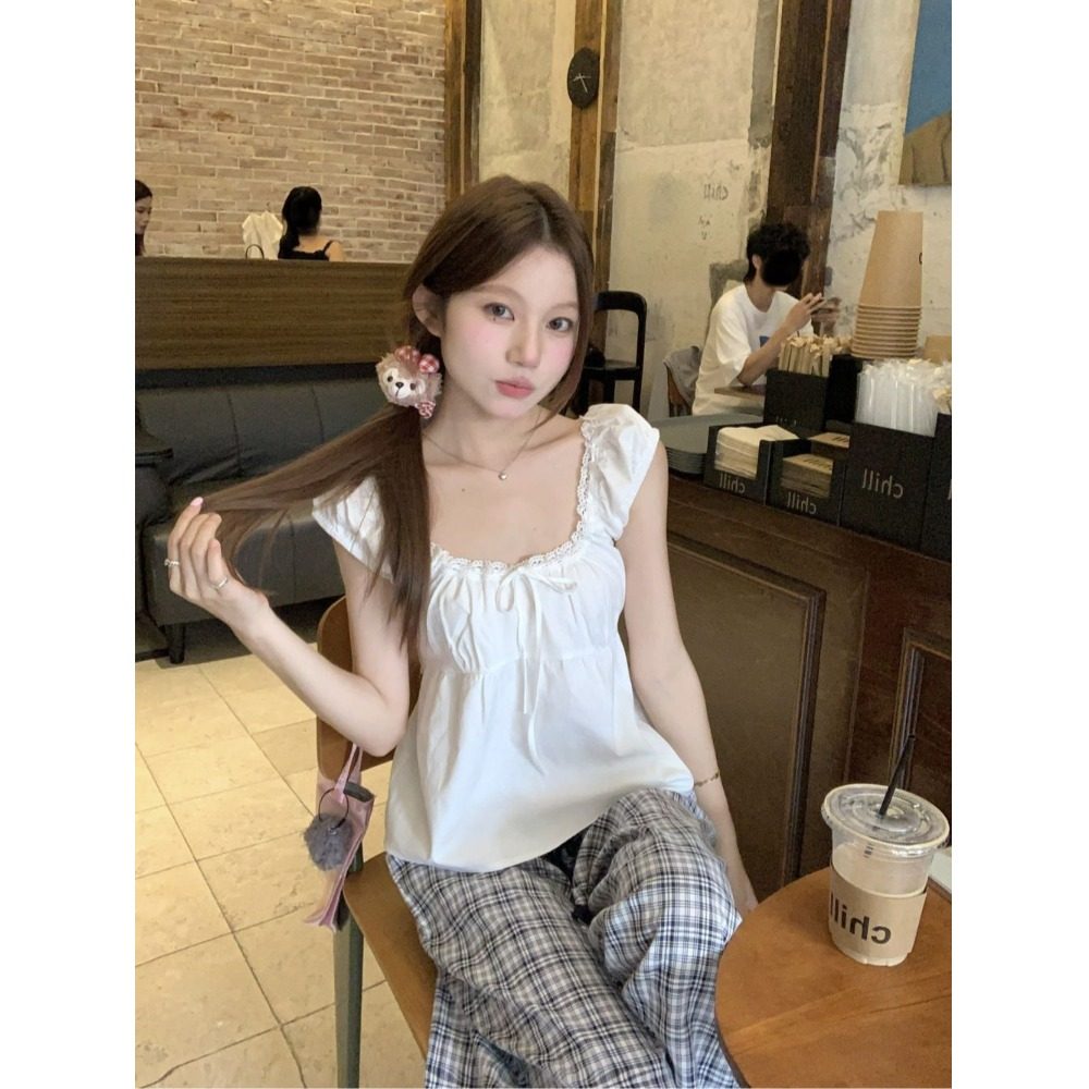白色甜美泡泡袖系带衬衫夏季设计法式娃娃宽松显瘦减龄韩系上衣