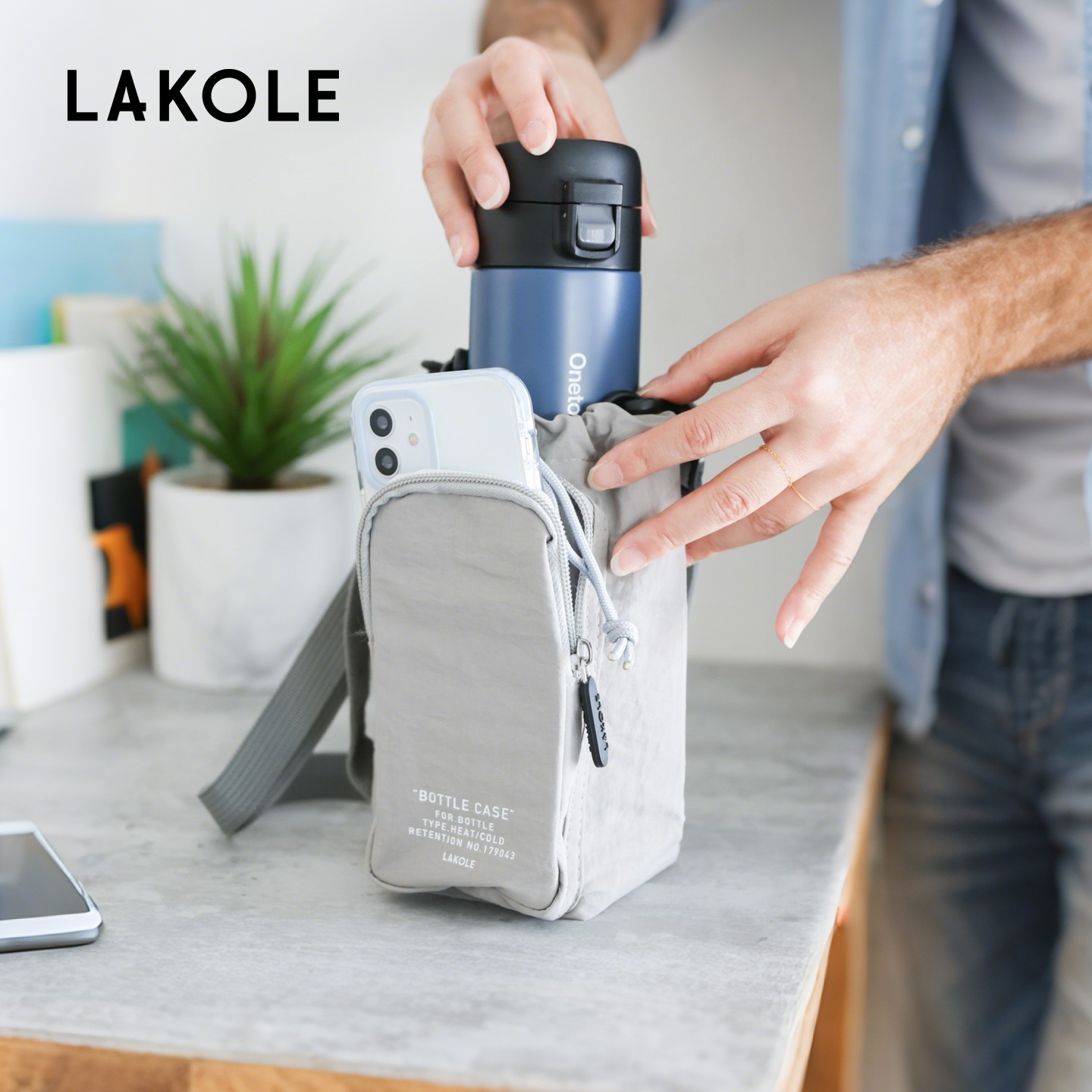 LAKOLE 小包2025新款简约便携抽绳户外水壶包单肩斜挎包287227