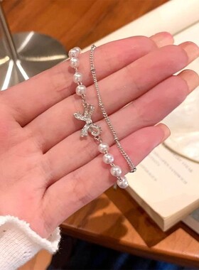 小清新双主层蝴蝶结珍手珠串轻奢小众精公手錬致ins闺蜜礼物网红