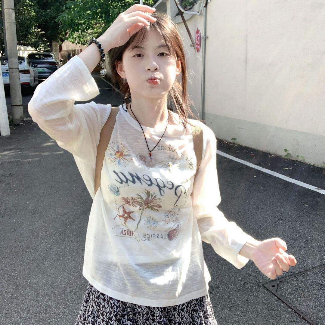 韩系甜美白色微透防晒长袖罩衫女图片