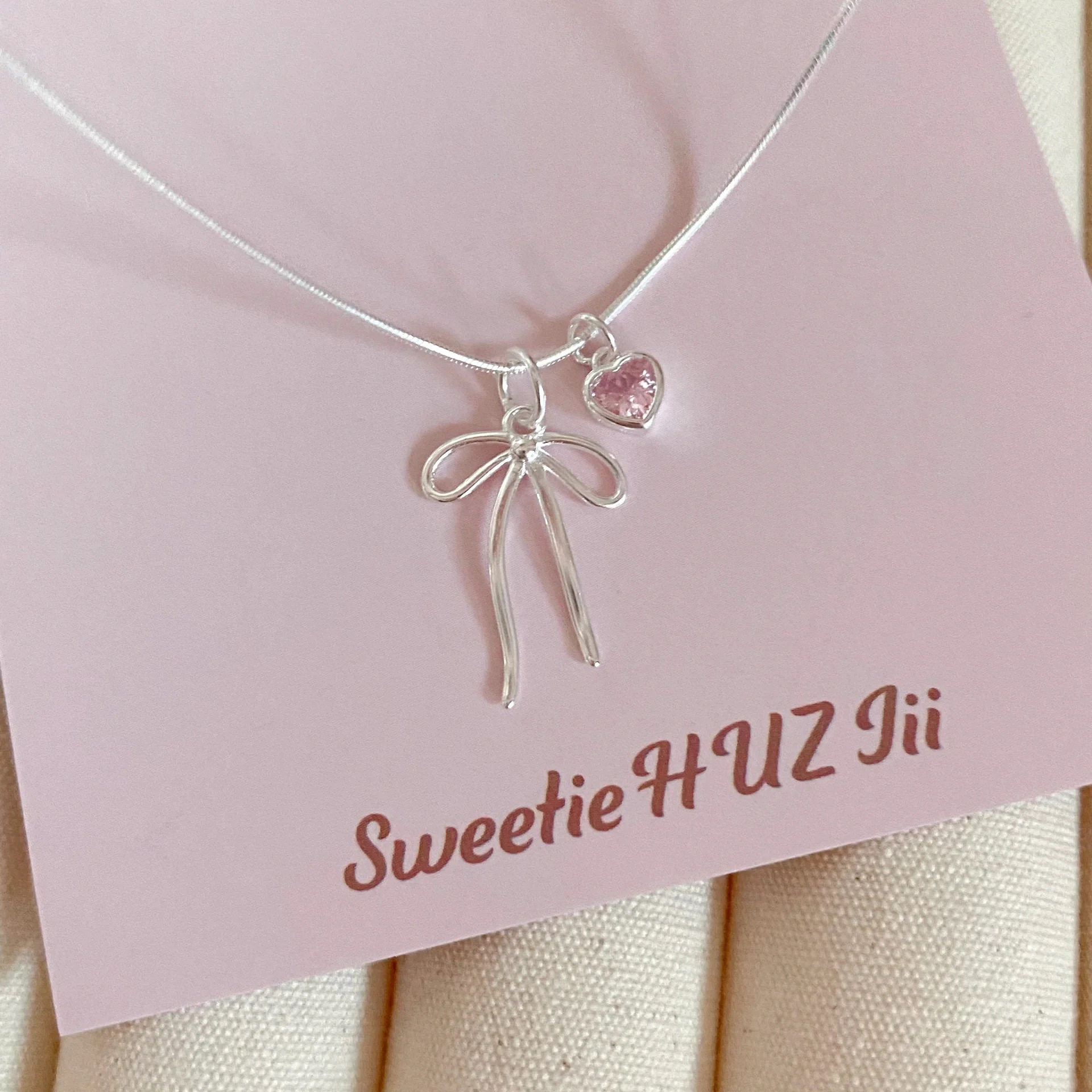S925纯银蝴蝶结粉钻爱心项链女小