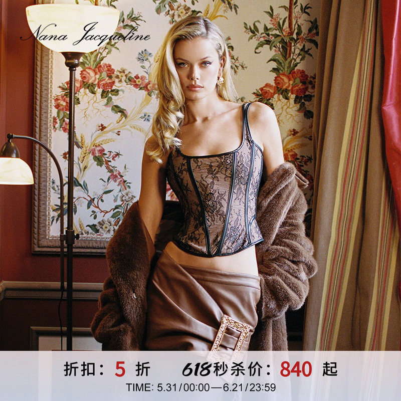 [甄选5折]NanaJacqueline复古大金扣装饰皮裙女不规则气质皮短裙
