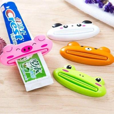 Cute Cartoon Rolling Toothpaste Squeezer Dispenser Facial Cl