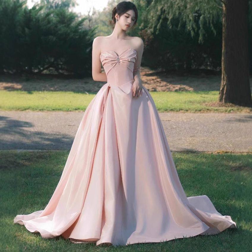 粉色抹胸晚礼服2025新款高级感小众性感露背晚宴轻奢旅拍轻婚纱厂