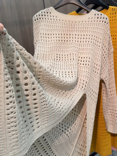 上衣女潮 百搭圆领套头镂空不规则开衩下摆针织衫 欧货2025春季 新款