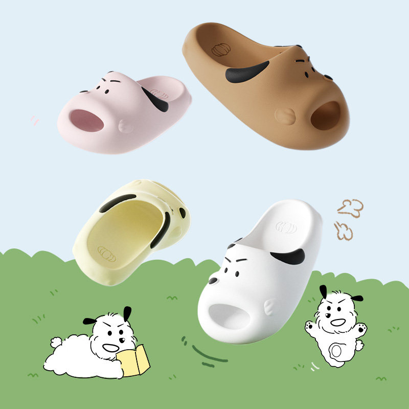 Colorful dog-themed slip-on clogs displayed on a pastel background