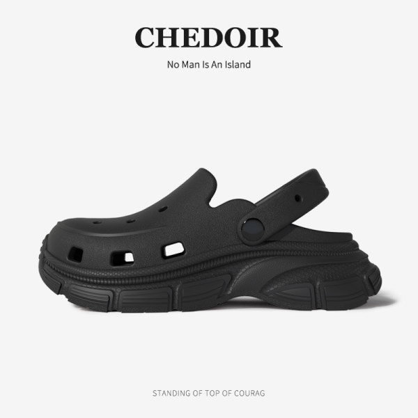 Black slip-on clog shoe on a white background