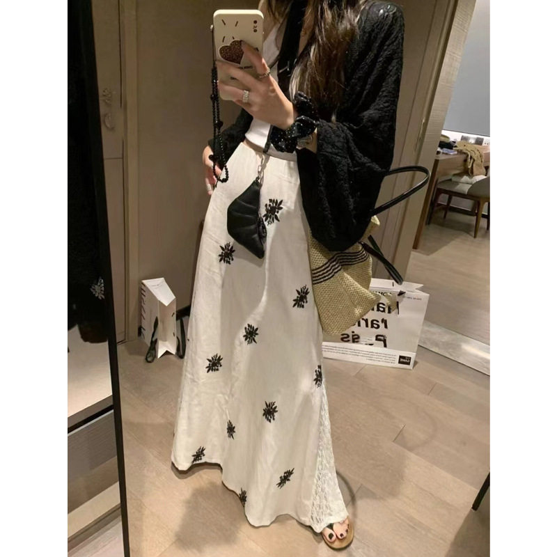 亚麻刺绣蕾丝拼接半身裙女2026夏新款a字中长款设计感裙子