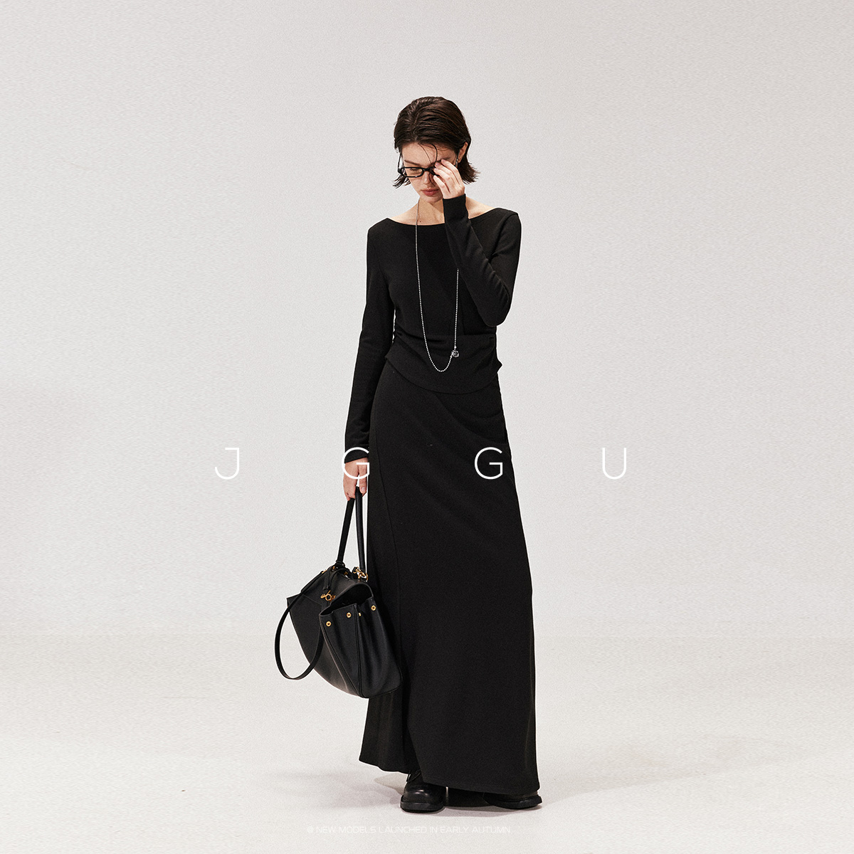 晶咕黑标JGGU高端混纺工艺针织褶皱肌理一字肩上衣鱼尾半身裙套装