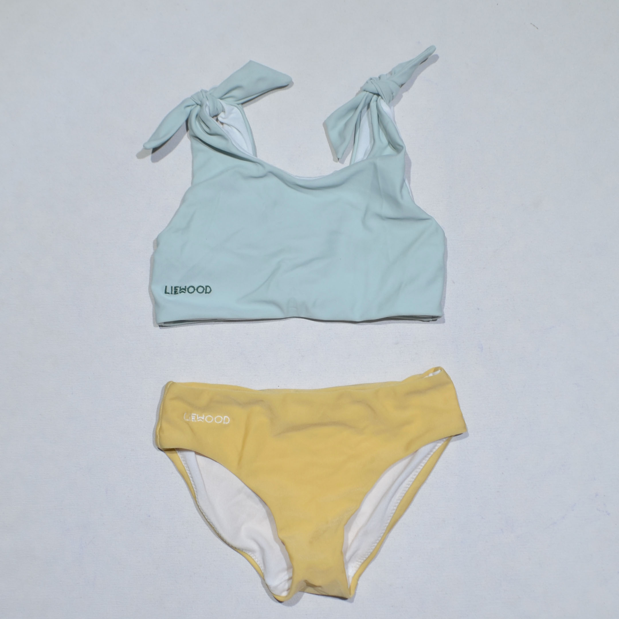 混搭浅黄裤绑结海滩分体泳衣女童