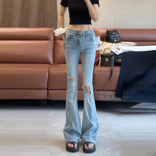 蓝色破洞高腰显瘦微喇牛仔裤女