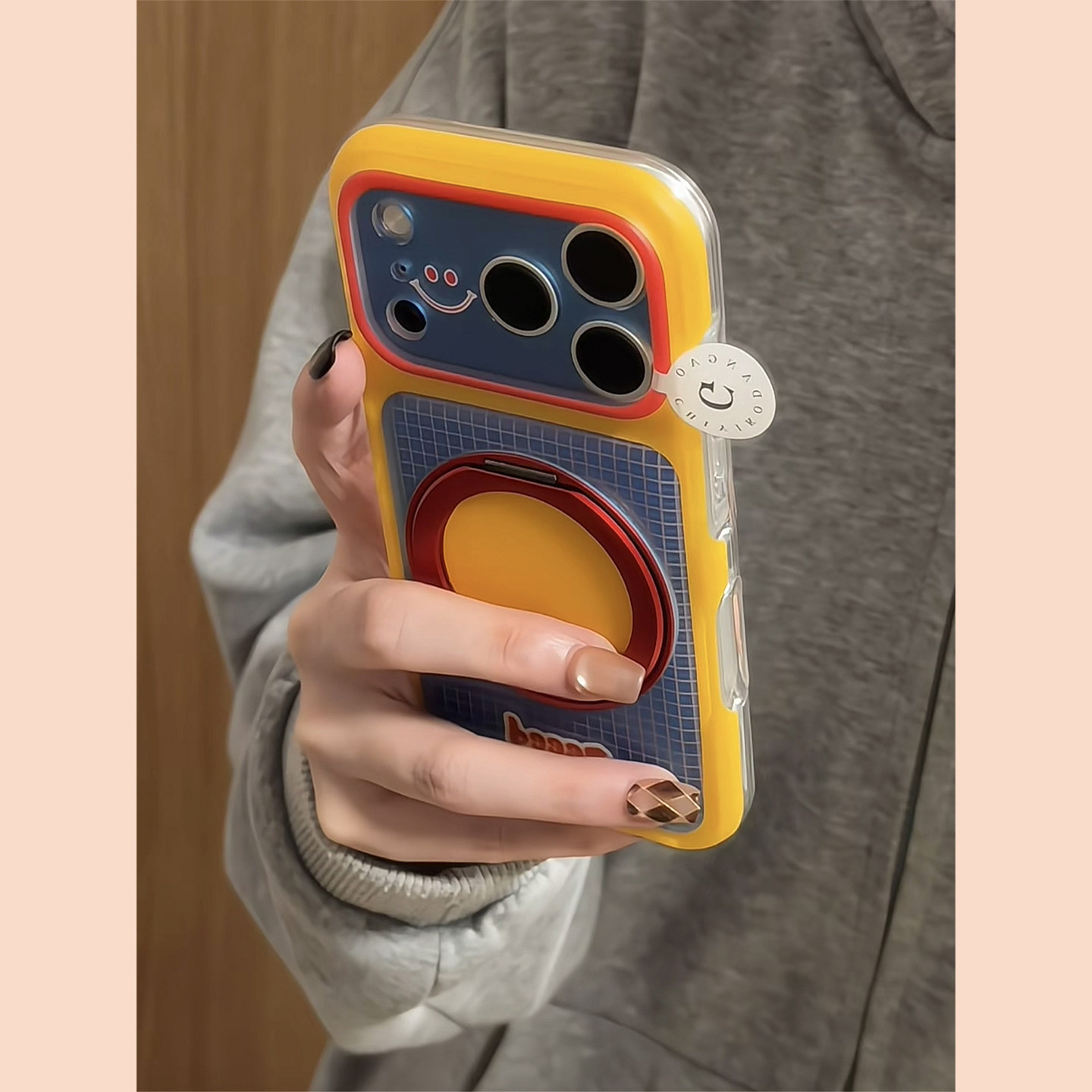 格纹撞色卡通笑脸360旋转支架适用苹果18promax手机壳iphone17pro新款16pro今年流行的15pro全包防摔保护套
