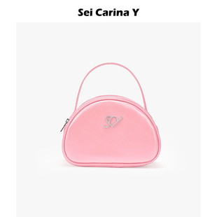 Carina 6折 Sei Y粉色亮皮橢圓LOGO手提包甜美小號包包女手拎