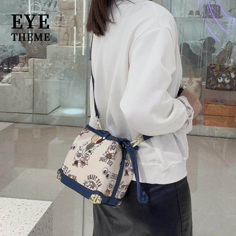 2025春季刺绣女士帆布单肩包迷你抽绳休闲斜挎包子母包