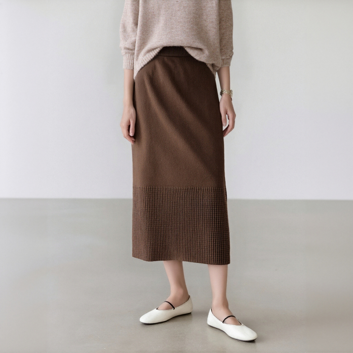 西町村屋简约半身裙女装冬季新款通勤针织百搭纯色半裙AD8903010