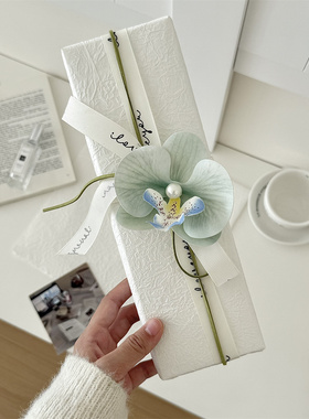 白色高级感石纹纸礼物包装纸褶皱纸DIY送节日礼物蝴蝶兰夹子装饰