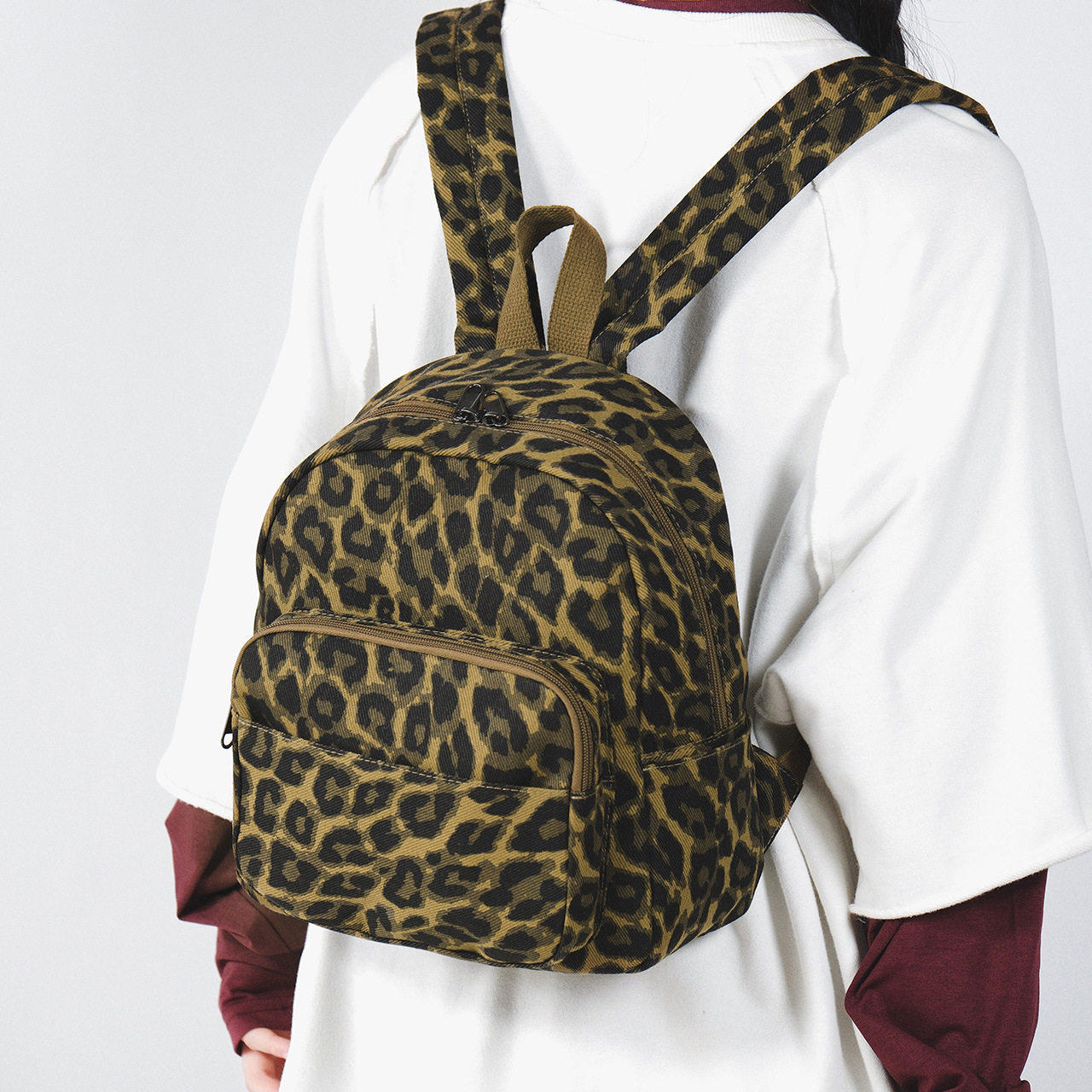 迷彩帆布背包女时尚豹纹少女校园风双肩包户外引闪旅行休闲双肩a4