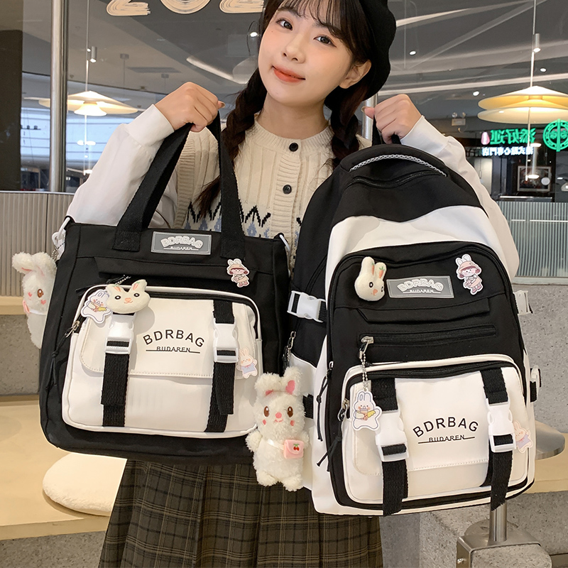 书包初中女生小学生可爱痛包双肩