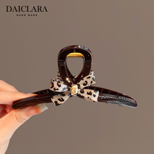 韩国优雅豹纹闪亮蝴蝶结大号抓夹女2025新款发量多盘发发夹鲨鱼夹