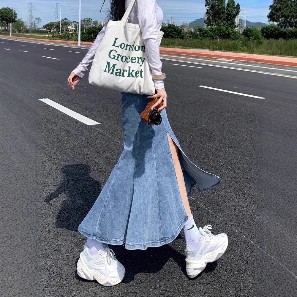 开叉牛仔半身裙女春夏2026新款高腰显中长款设计感包臀鱼尾裙子