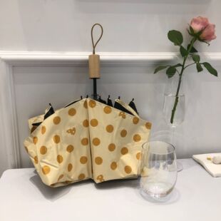 软萌芝士2022年奶油黄晴雨伞黑胶折叠遮阳伞创意女士雨伞木质手柄