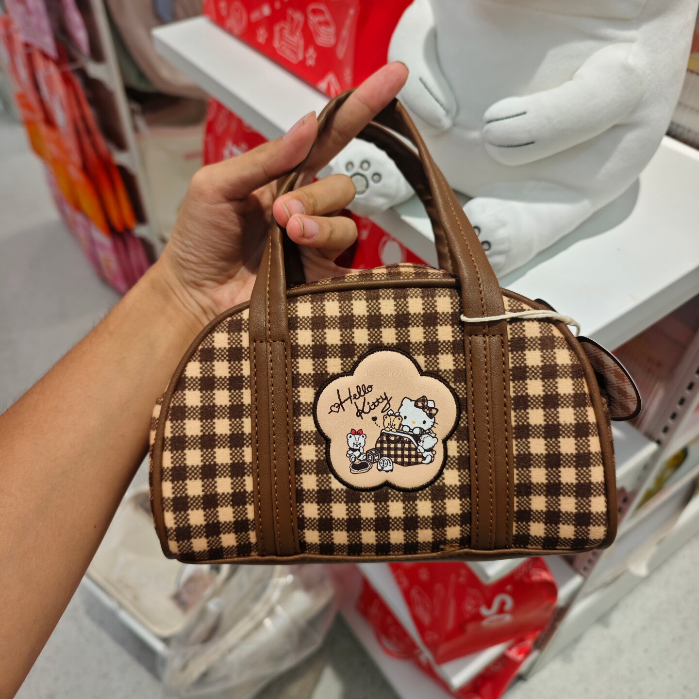 MINISO摩卡格纹系列HelloKitty斜跨保龄球包名创优品