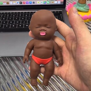 丑娃娃捏捏乐慢回弹黑人娃娃丑萌玩具拉拉乐掌心橡胶黑皮玩偶公仔