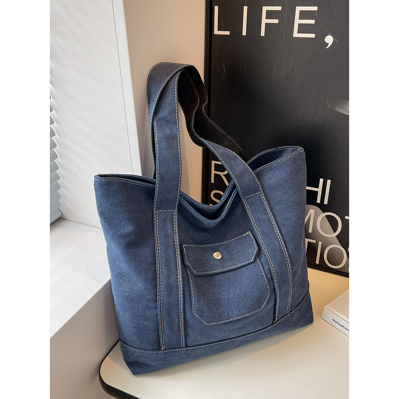 .韩国大容量牛仔布包包女2024新款潮小众复古通勤手提袋帆布托特