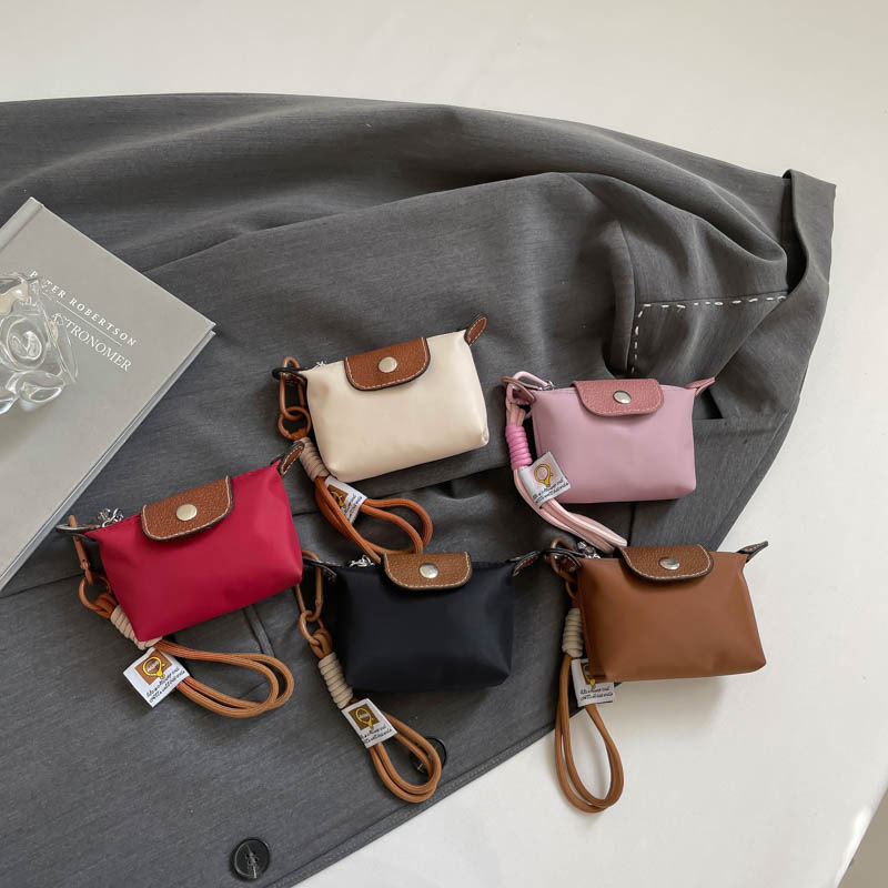 超迷你尼龙饺子包2025跨境新款可爱卡包钥匙耳机口红收纳包小包包